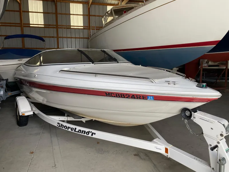 Slide: The Image of 1995 Wellcraft 196 S Eclipse boat on ShoreLand'r trailer in storage. - 0