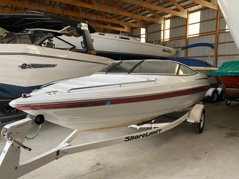 Slide: The Image of 1995 Wellcraft 196 S Eclipse boat on ShoreLand'r trailer in storage facility. - 1