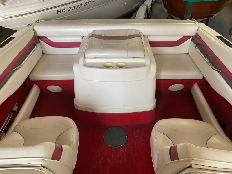 Slide: The Image of Interior of a 1995 Wellcraft 196 S Eclipse boat with red and white seating. - 25