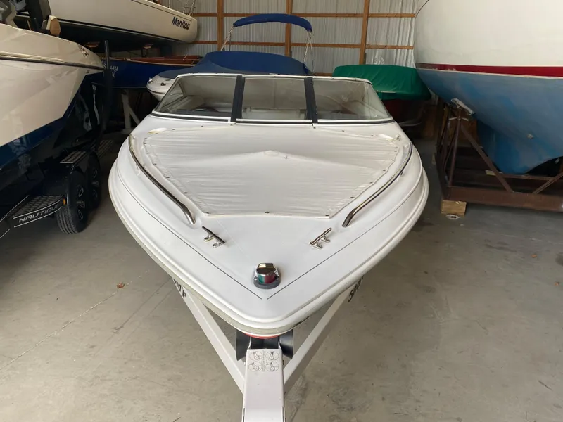 Slide: The Image of 1995 Wellcraft 196 S Eclipse boat in storage, front view. - 4