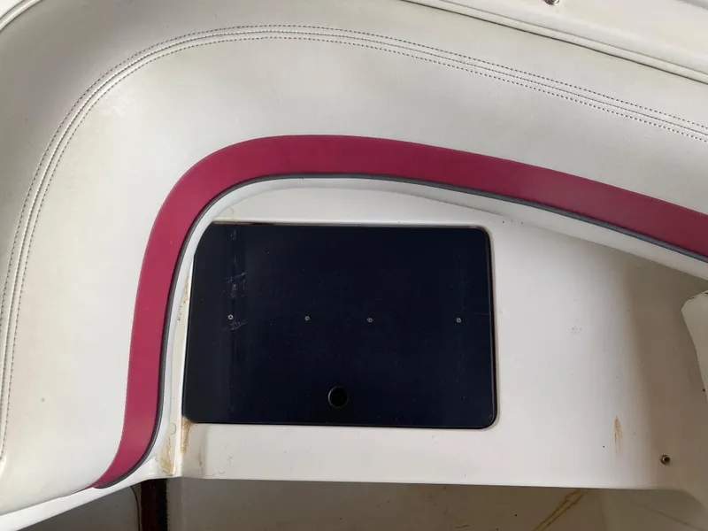 Slide: The Image of Interior detail of 1995 Wellcraft 196 S Eclipse boat with red and white upholstery. - 9