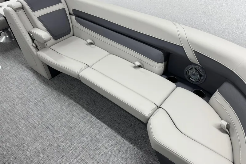 Slide: The Image of Luxurious seating in 2025 Barletta Cabrio 24UC boat, featuring sleek design and integrated cup holders. - 23