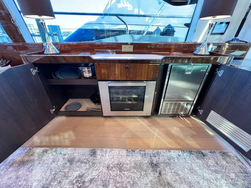 Slide: The Image of Modern kitchen interior of 2020 Fairline Squadron 68 yacht with appliances and storage. - 19