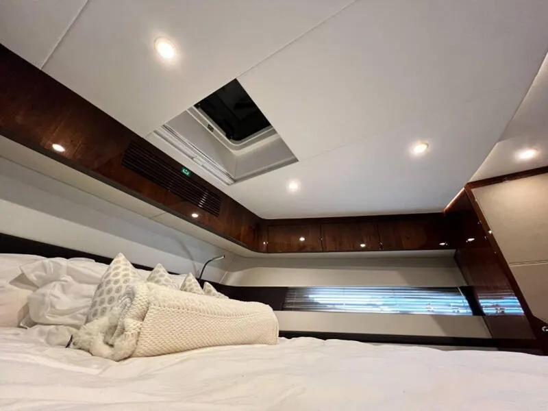 Slide: The Image of Luxurious cabin interior of 2020 Fairline Squadron 68 yacht with elegant bedding. - 28
