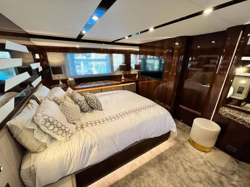 Slide: The Image of Luxurious bedroom interior of 2020 Fairline Squadron 68 yacht with elegant decor. - 45