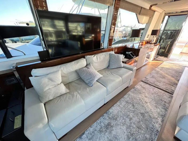 Slide: The Image of Luxurious interior of 2020 Fairline Squadron 68 yacht with plush seating and modern decor. - 6