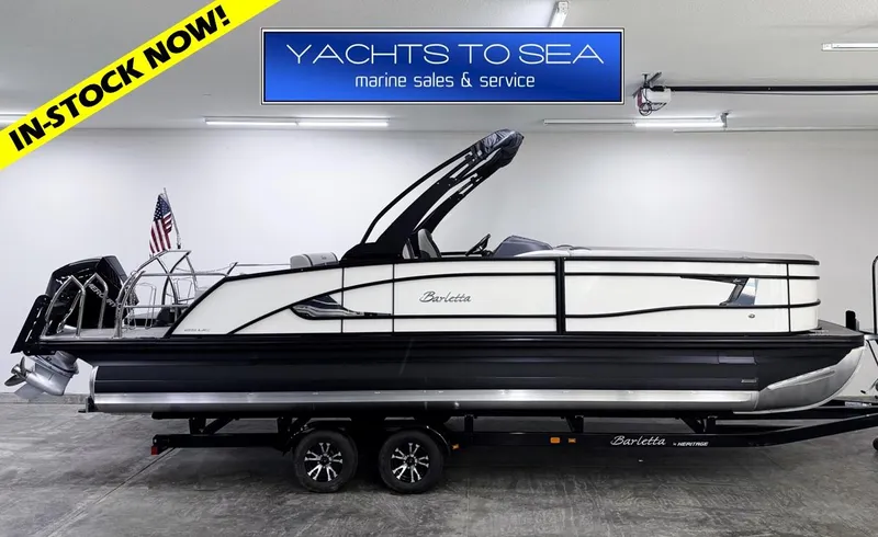Slide: The Image of 2025 Barletta Lusso 25UC pontoon boat in showroom, available at Yachts to Sea. - 1