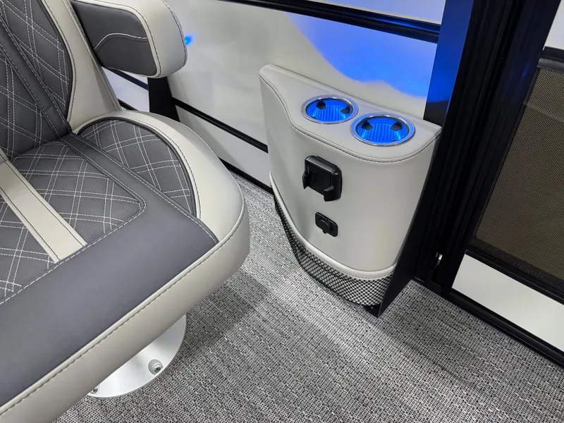 Slide: The Image of Luxurious Barletta Lusso 25UC 2025 interior with illuminated cup holders and premium seating. - 19