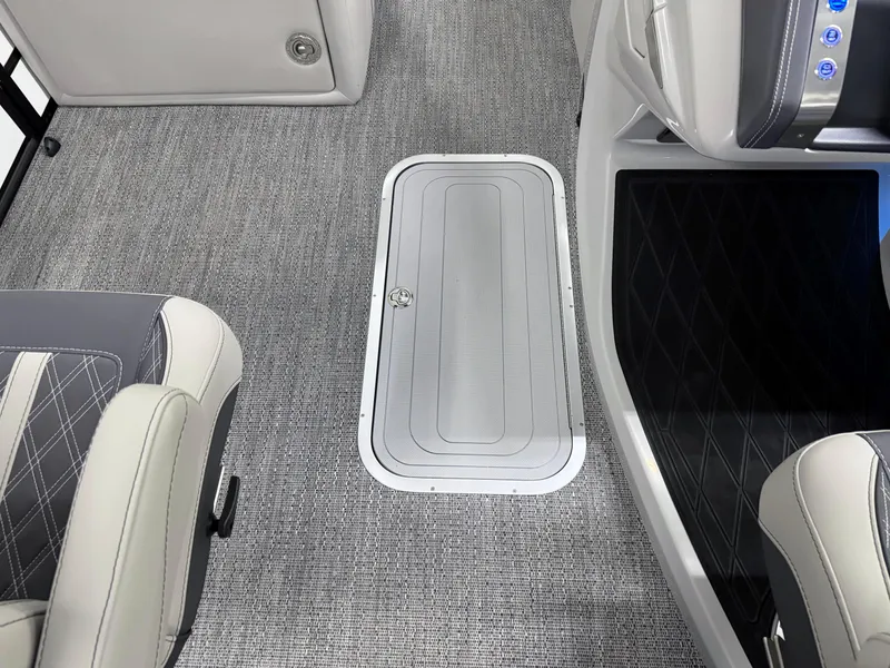 Slide: The Image of 2025 Barletta Lusso 25UC interior with gray flooring and seating. - 23