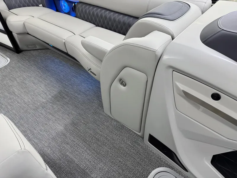 Slide: The Image of 2025 Barletta Lusso 25UC interior with luxurious seating and modern design. - 25