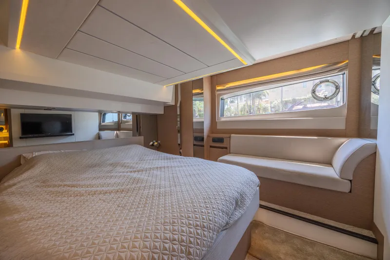 Slide: The Image of Luxurious interior of a 2018 Prestige 520 yacht with a cozy bedroom and modern design. - 28