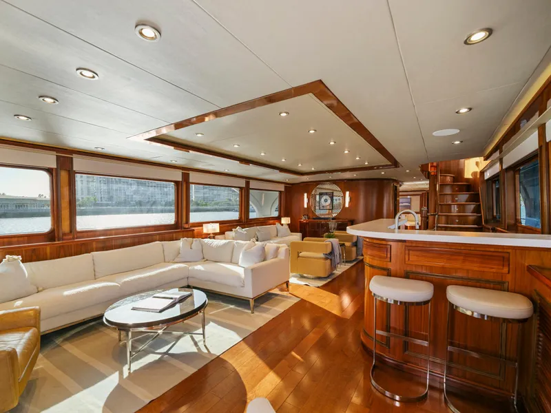 Slide: The Image of Luxurious interior of 2010 President Sterling yacht with elegant seating and bar area. - 26