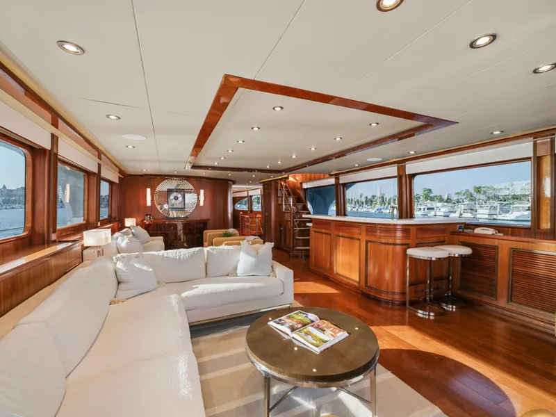 Slide: The Image of Luxurious 2010 President Sterling yacht interior with elegant wood finishes and spacious seating area. - 27