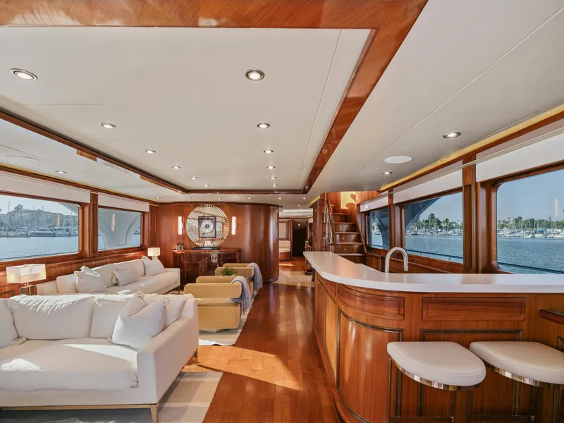 Slide: The Image of Luxurious 2010 President Sterling yacht interior with elegant wood finishes and spacious seating area. - 29