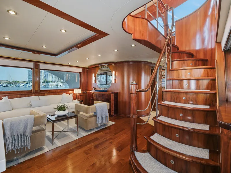 Slide: The Image of Luxurious 2010 President Sterling yacht interior with elegant wood staircase and comfortable seating area. - 36