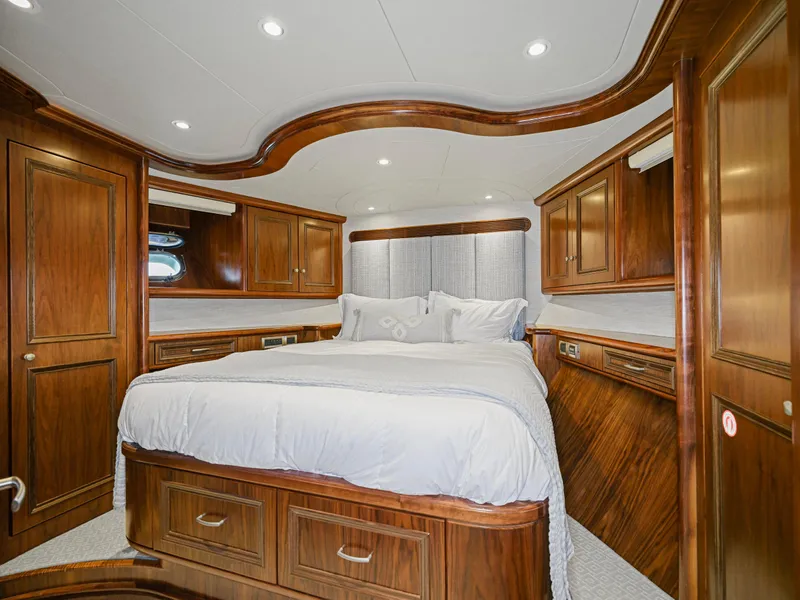 Slide: The Image of Luxurious wooden yacht bedroom interior, President Sterling 2010 model, with elegant bedding. - 48