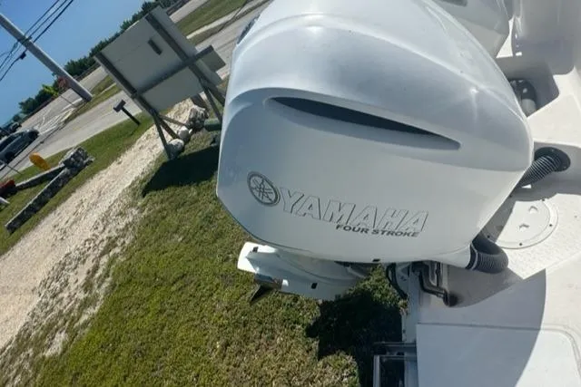 Slide: The Image of Yamaha four-stroke engine on 2015 Everglades 295 Center Console boat. - 13