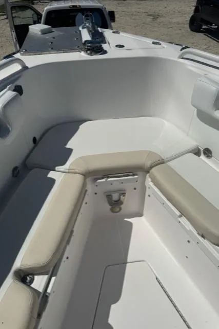 Slide: The Image of 2015 Everglades 295 Center Console boat interior with cushioned seating. - 23