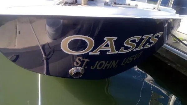 Slide: The Image of Columbia Cutter 1993 sailboat named "Oasis" docked in St. John, USVI. - 19