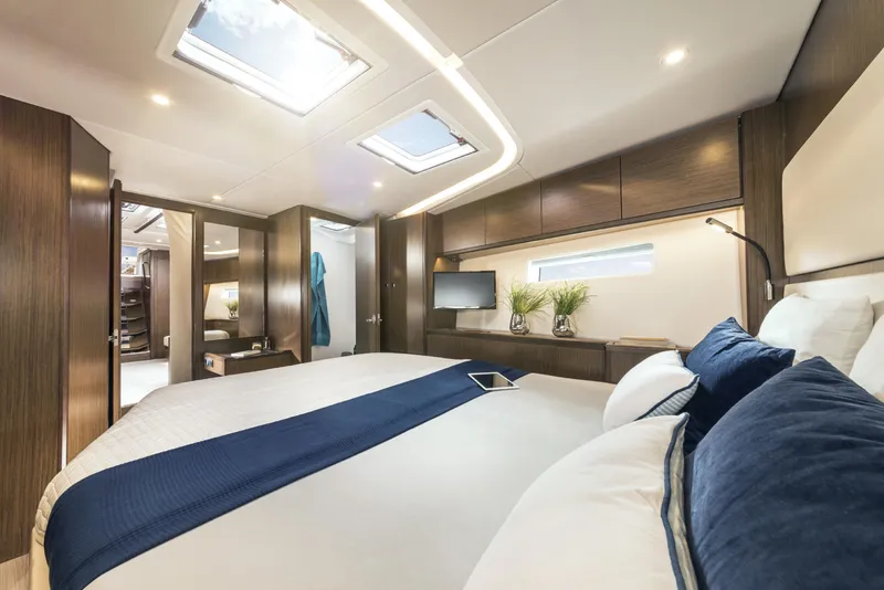 Slide: The Image of Luxurious interior of 2025 Bavaria C57 yacht with elegant bedroom design. - 20