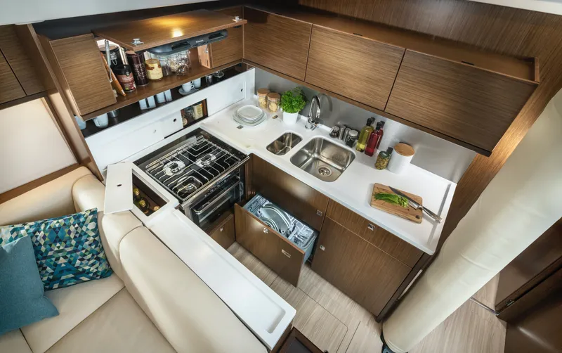 Slide: The Image of Modern kitchen in 2025 Bavaria C57 yacht with sleek cabinetry and appliances. - 29