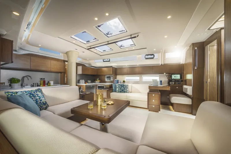Slide: The Image of Luxurious interior of 2025 Bavaria C57 yacht with modern furnishings and skylights. - 30