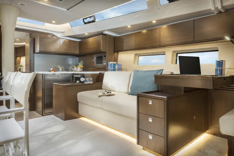 Slide: The Image of Luxurious interior of 2025 Bavaria C57 yacht with modern kitchen and seating area. - 33