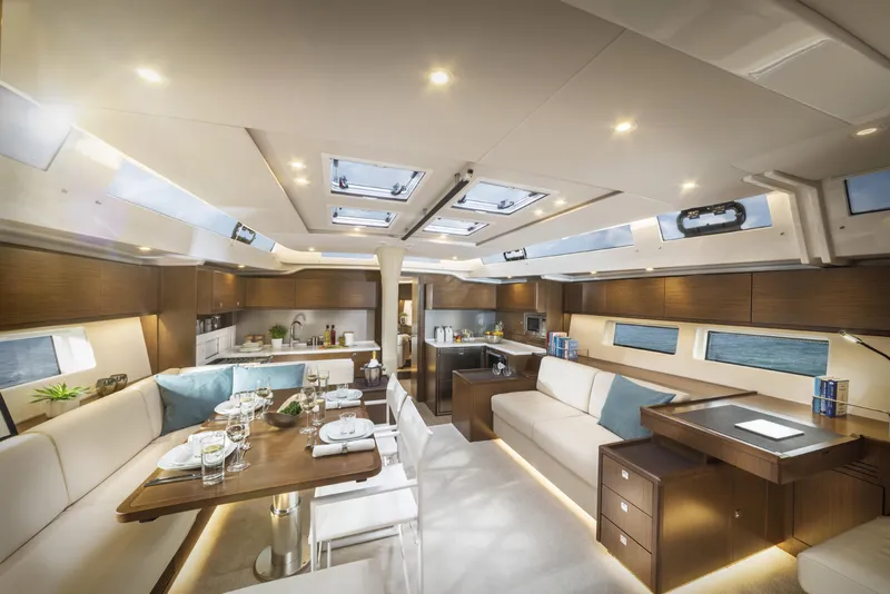 Slide: The Image of Luxurious interior of 2025 Bavaria C57 yacht with elegant dining and seating areas. - 34