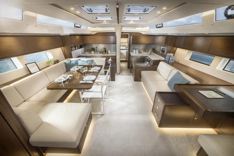 Slide: The Image of Luxurious interior of 2025 Bavaria C57 yacht with elegant seating and dining area. - 35