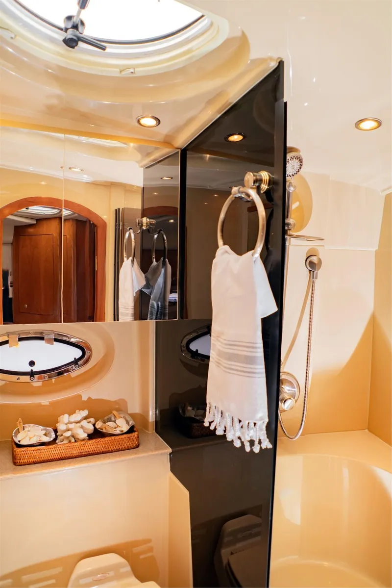 Slide: The Image of Luxurious bathroom interior of 2005 Cruisers Yachts 370 Express with elegant fixtures and decor. - 7