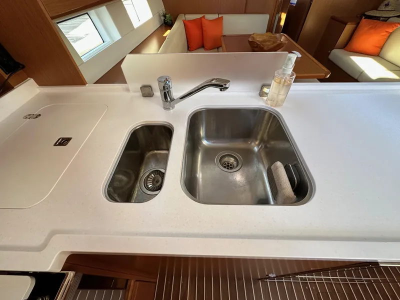 Slide: The Image of Modern kitchen sink in 2024 Bavaria C45 yacht, featuring dual basins and sleek design. - 38