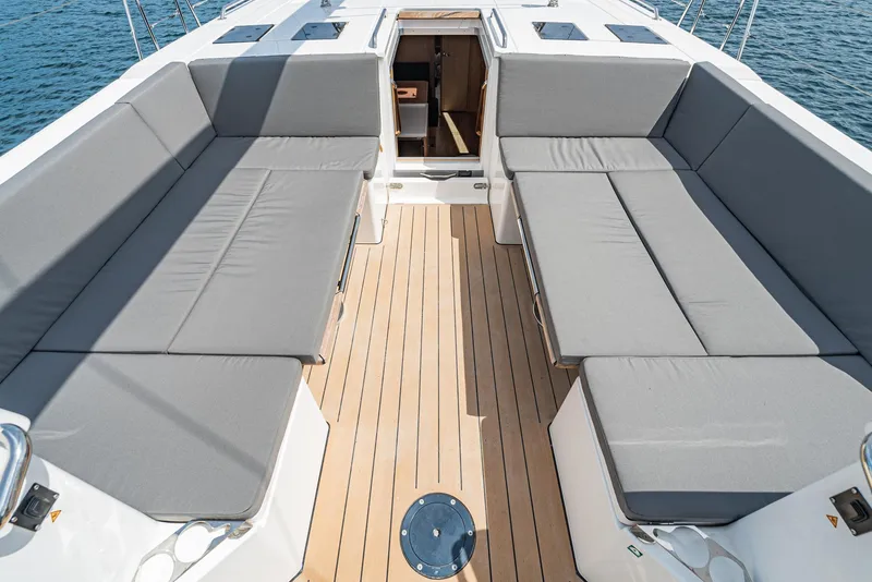 Slide: The Image of 2024 Bavaria C50 yacht cockpit with spacious seating and teak flooring. - 42