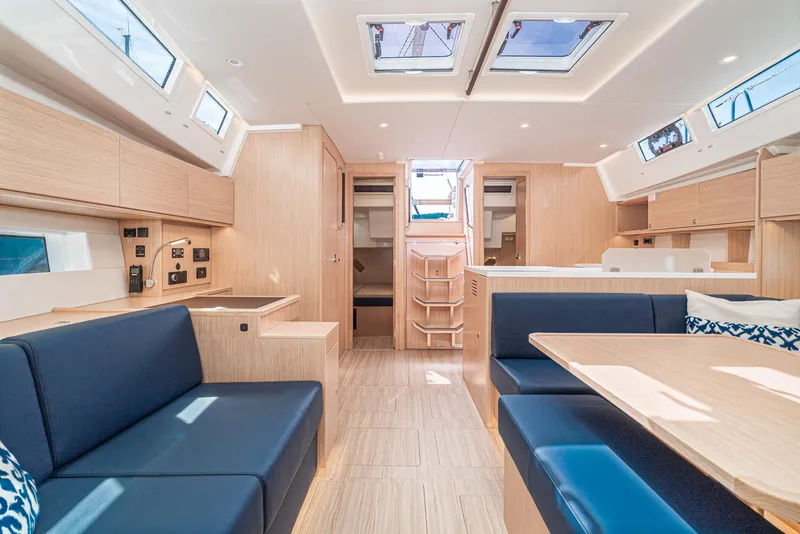 Slide: The Image of Luxurious interior of 2024 Bavaria C50 yacht with modern seating and wooden finishes. - 44