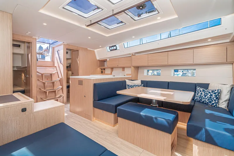 Slide: The Image of Luxurious interior of 2024 Bavaria C50 yacht with modern seating and natural light. - 47