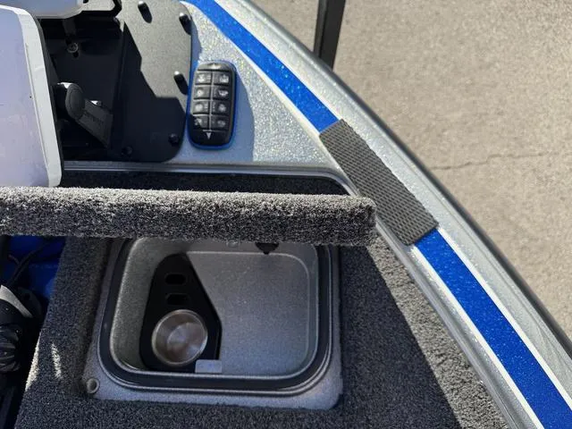 Slide: The Image of 2015 Legend V20 boat deck with control panel and storage compartment. - 13