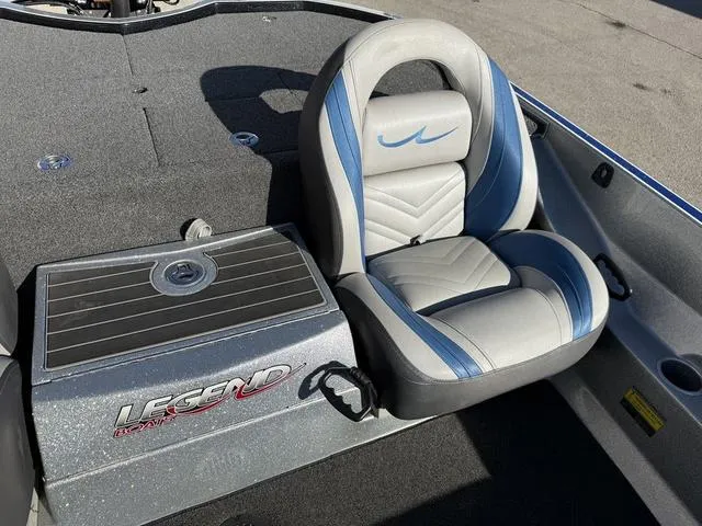 Slide: The Image of Legend V20 boat seat, 2015 model, with blue and gray upholstery. - 16