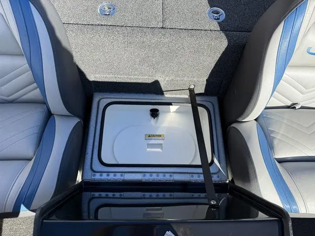 Slide: The Image of Interior of a 2015 Legend V20 boat with seating and storage compartment. - 19