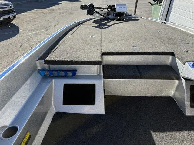 Slide: The Image of 2015 Legend V20 boat deck with carpeted surface and mounted equipment. - 20