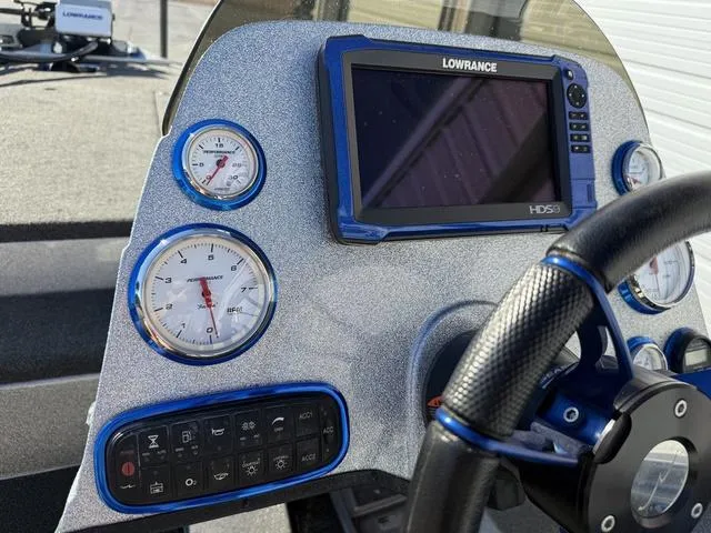 Slide: The Image of Dashboard of a 2015 Legend V20 boat with Lowrance HDS5 display and gauges. - 21