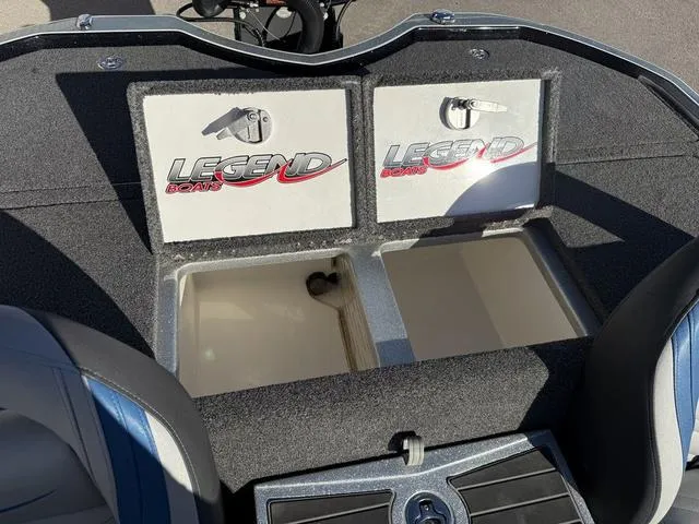 Slide: The Image of Legend V20 boat storage compartments, 2015 model, with dual locking hatches. - 24