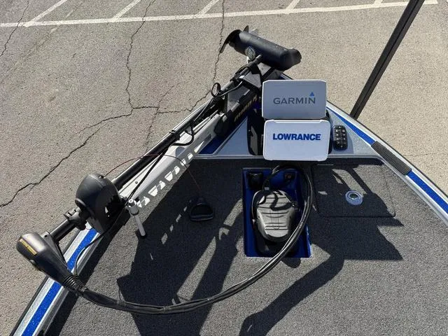 Slide: The Image of 2015 Legend V20 boat deck with Garmin and Lowrance electronics, trolling motor, and foot pedal. - 9