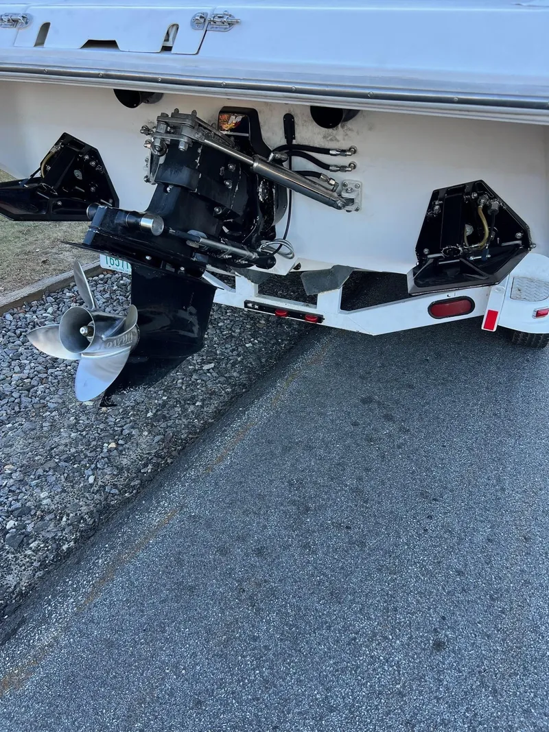 Slide: The Image of 2004 Fountain 29 Fever boat stern with propeller and outdrive on trailer. - 4
