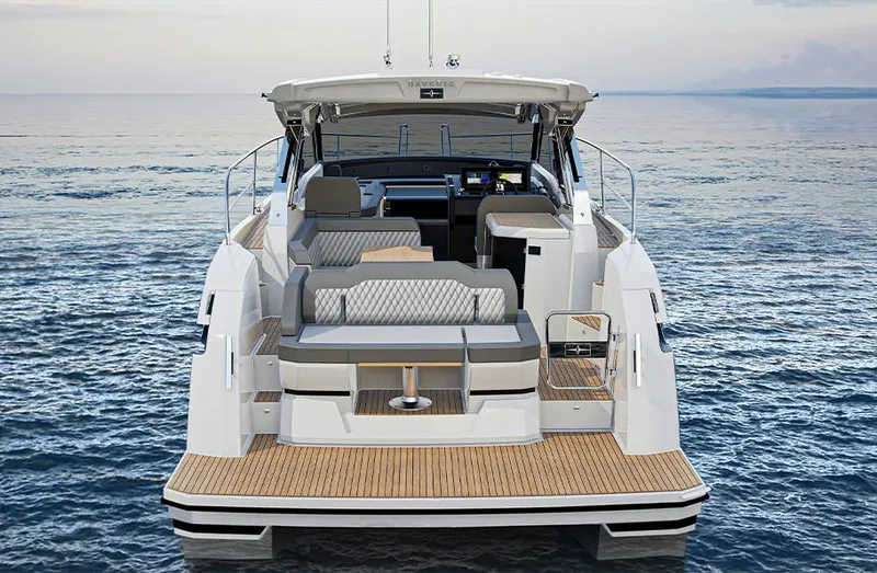 Slide: The Image of 2025 Bavaria SR33 yacht on calm sea, showcasing luxurious deck and seating area. - 14