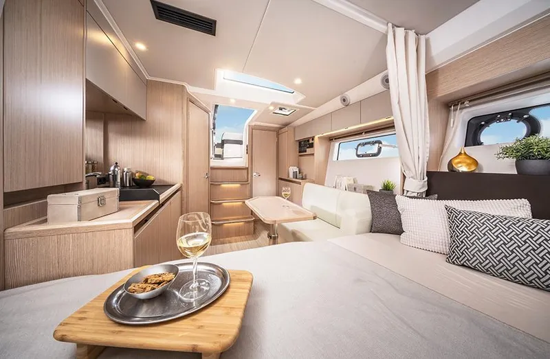 Slide: The Image of Luxurious interior of 2025 Bavaria SR33 yacht with modern furnishings and elegant decor. - 20