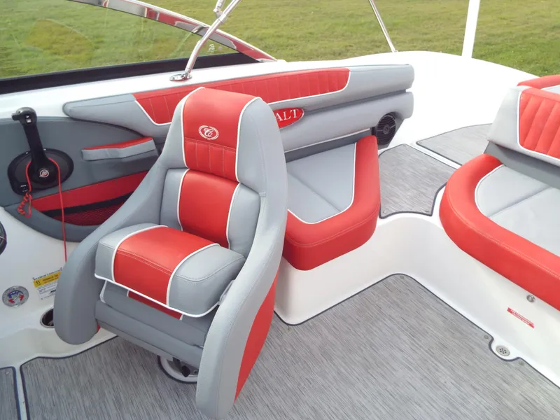 Slide: The Image of 2021 Cobalt CS22 boat interior with red and gray seating, featuring modern design elements. - 6