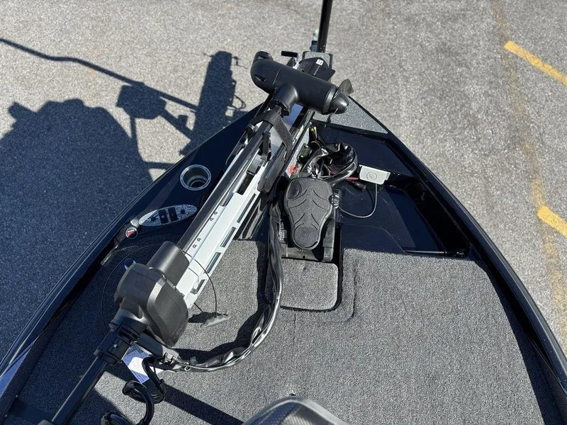 Slide: The Image of 2025 Bass Cat Puma STS boat deck with trolling motor and foot pedal. - 14