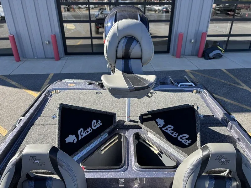 Slide: The Image of 2025 Bass Cat Puma STS boat interior with seating and storage compartments. - 15