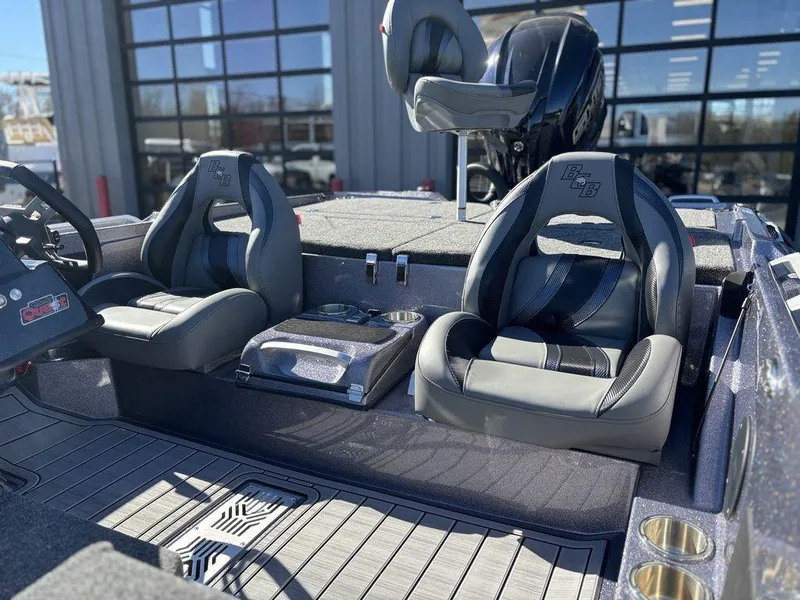 Slide: The Image of 2025 Bass Cat Puma STS boat interior with sleek seating and modern design. - 7