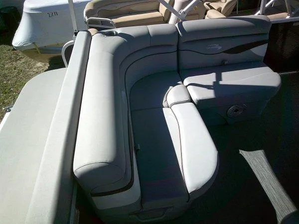 Slide: The Image of 2023 Bennington 208SLJ Tri-toon boat interior with plush seating. - 4