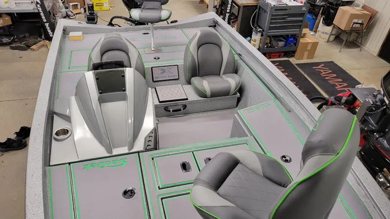 Slide: The Image of 2023 Xpress H18C Crappie boat interior with Yamaha Vmax 115 SHO engine, in stock. - 15